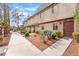 Charming townhome featuring a well-manicured front yard with desert landscaping and a private entrance at 3986 Visby Ln, Las Vegas, NV 89119