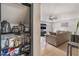 View of the cozy living room with neutral tones, seen from the adjacent pantry at 3986 Visby Ln, Las Vegas, NV 89119