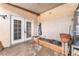Cozy outdoor patio with double door access, ideal for relaxing and gardening at 3986 Visby Ln, Las Vegas, NV 89119