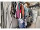 Walk-in closet featuring built-in shelving for optimal storage and organization at 3986 Visby Ln, Las Vegas, NV 89119