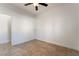 Bright bedroom with tile flooring and a ceiling fan at 4014 Trapani Pl, Las Vegas, NV 89141