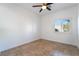 Bedroom with tile flooring and a window with shutters at 4014 Trapani Pl, Las Vegas, NV 89141
