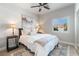 Bright and airy bedroom with a comfortable bed, neutral colors, and plantation shutters at 4014 Trapani Pl, Las Vegas, NV 89141