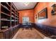 Elegant office with custom wood shelving, accent lighting, and a decorative rug at 4014 Trapani Pl, Las Vegas, NV 89141