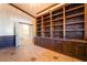 Office with built-in shelving, paneled walls, and decorative molding at 4014 Trapani Pl, Las Vegas, NV 89141
