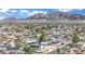 Expansive aerial view of a residential area with mountain views in the background on a bright, sunny day at 4414 E Baltimore Ave, Las Vegas, NV 89104