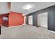 Open basement floor plan with gray carpet and neutral colors, providing a blank canvas at 4414 E Baltimore Ave, Las Vegas, NV 89104