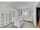 Bright bedroom featuring white furniture, shelving, and a window for natural light at 4414 E Baltimore Ave, Las Vegas, NV 89104