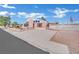Traditional brick house with mature landscaping and a driveway at 4414 E Baltimore Ave, Las Vegas, NV 89104