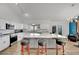 Bright kitchen with an island, pendant lights, and stainless steel appliances offering ample counter space at 4414 E Baltimore Ave, Las Vegas, NV 89104