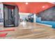 Spacious living room featuring modern hardwood floors, an orange ceiling, and soundproofing at 4414 E Baltimore Ave, Las Vegas, NV 89104