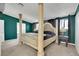 Beautiful main bedroom featuring a bed with ornate pillars and plenty of natural light at 4414 E Baltimore Ave, Las Vegas, NV 89104