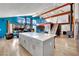 Open floor plan boasts an expansive island, loft, and a cozy living area perfect for relaxation and entertainment at 4414 E Baltimore Ave, Las Vegas, NV 89104