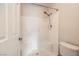 Clean bathroom featuring an all-white shower and toilet at 5162 S Jones Blvd # 108, Las Vegas, NV 89118