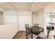 Dining area with a round table and mirrored wall, creating a bright and open feel at 5162 S Jones Blvd # 108, Las Vegas, NV 89118