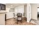 Cozy dining area with a table and chairs, adjacent to the kitchen and living spaces at 5162 S Jones Blvd # 108, Las Vegas, NV 89118