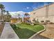 Community playground with modern equipment, surrounded by green space and mature landscaping at 5162 S Jones Blvd # 108, Las Vegas, NV 89118