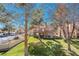 Expansive community backyard with lush lawns and mature trees offer a great place for recreation at 5305 La Patera Ln, Las Vegas, NV 89149