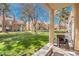 Inviting backyard featuring a well-maintained lawn, perfect for outdoor activities and relaxation at 5305 La Patera Ln, Las Vegas, NV 89149