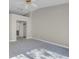 Spacious carpeted bedroom featuring access to an ensuite bathroom and closets at 5305 La Patera Ln, Las Vegas, NV 89149