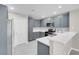 Kitchen features stainless steel appliances, gray cabinets, and light countertops, and recessed lighting at 5305 La Patera Ln, Las Vegas, NV 89149