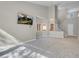 Spacious living room with high ceilings, a fireplace, and modern lighting at 5305 La Patera Ln, Las Vegas, NV 89149