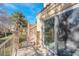 View of the community from the privacy of the enclosed rear patio with sliding door access at 5305 La Patera Ln, Las Vegas, NV 89149