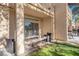 The outdoor patio features comfortable seating and a view of the grassy lawn, perfect for relaxing or entertaining guests at 5305 La Patera Ln, Las Vegas, NV 89149