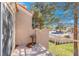 A charming patio with a wrought iron railing overlooks a beautiful community at 5305 La Patera Ln, Las Vegas, NV 89149