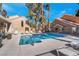 Community pool featuring ample seating for residents to enjoy the sun and socialize at 5305 La Patera Ln, Las Vegas, NV 89149