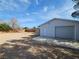 Large backyard with ample space, concrete patio, storage shed and mature trees, provides outdoor possibilities at 5350 Topaz St, Las Vegas, NV 89120