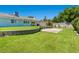 Expansive backyard featuring lush lawn and concrete patio area at 5350 Topaz St, Las Vegas, NV 89120