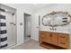 Beautiful renovated bathroom featuring subway tile in the walk-in shower and a decorative vanity at 5350 Topaz St, Las Vegas, NV 89120