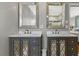 Elegant primary bathroom features dual vanities with decorative mirrors and a stylish design at 5350 Topaz St, Las Vegas, NV 89120