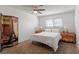 Well-lit bedroom with Eiffel Tower themed decor, white bedding, and stylish nightstands at 5350 Topaz St, Las Vegas, NV 89120