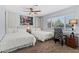 Bright bedroom features two twin beds and a zebra print desk chair at 5350 Topaz St, Las Vegas, NV 89120