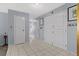 Entryway with tile floors and white paneled doors and light blue walls at 5350 Topaz St, Las Vegas, NV 89120