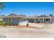 Charming single-story home with a well-maintained lawn and blue-painted exterior at 5350 Topaz St, Las Vegas, NV 89120