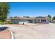 Charming single-story home with a well-maintained lawn and blue-painted exterior at 5350 Topaz St, Las Vegas, NV 89120
