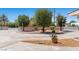 Landscaped front yard with decorative gravel and manicured trees at 5350 Topaz St, Las Vegas, NV 89120