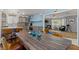 Open-concept kitchen with a dining table and a seamless transition to the living area at 5350 Topaz St, Las Vegas, NV 89120