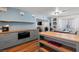 An open kitchen with stainless steel appliances and hardwood floors connects to the dining area at 5350 Topaz St, Las Vegas, NV 89120