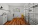 Laundry room with a washing machine, sink, and wire shelving unit at 5350 Topaz St, Las Vegas, NV 89120