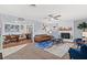 Open living space with modern decor, comfortable seating, and an open view to the dining area at 5350 Topaz St, Las Vegas, NV 89120