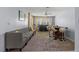 The living room with a sectional sofa and high top seating at 5350 Topaz St, Las Vegas, NV 89120