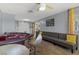 Living room features high top seating, a sectional sofa, and neutral gray walls at 5350 Topaz St, Las Vegas, NV 89120