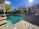 Gorgeous backyard pool with a pergola and well-maintained landscaping, perfect for relaxation at 5740 N Park St, Las Vegas, NV 89149