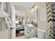Charming bathroom with modern vanity, fixtures, and neutral color scheme at 585 Jackson Dr, Henderson, NV 89014