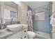Updated bathroom with stylish vanity, walk-in shower, and contemporary design at 585 Jackson Dr, Henderson, NV 89014