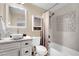 Elegant bathroom features a stylish vanity, shower, and decorative mirror at 585 Jackson Dr, Henderson, NV 89014